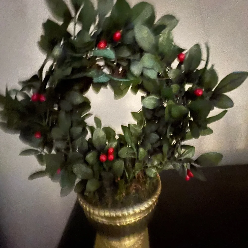 Green Boxwood Wreath with Red Velvet Bow on gold holder